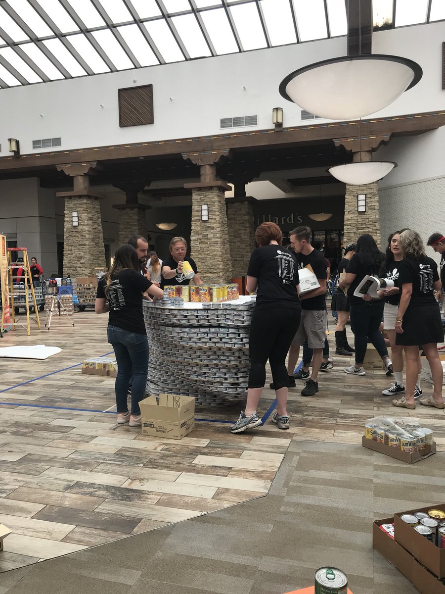 StudioSWArch's tweet photo. Two hours in to build and our sculpture is finally taking shape! Any guesses as to what it is? 🤔 #CANstruction2018 #CANSantaFe2018 #RockCANRoll https://t.co/IX4U150V2Z