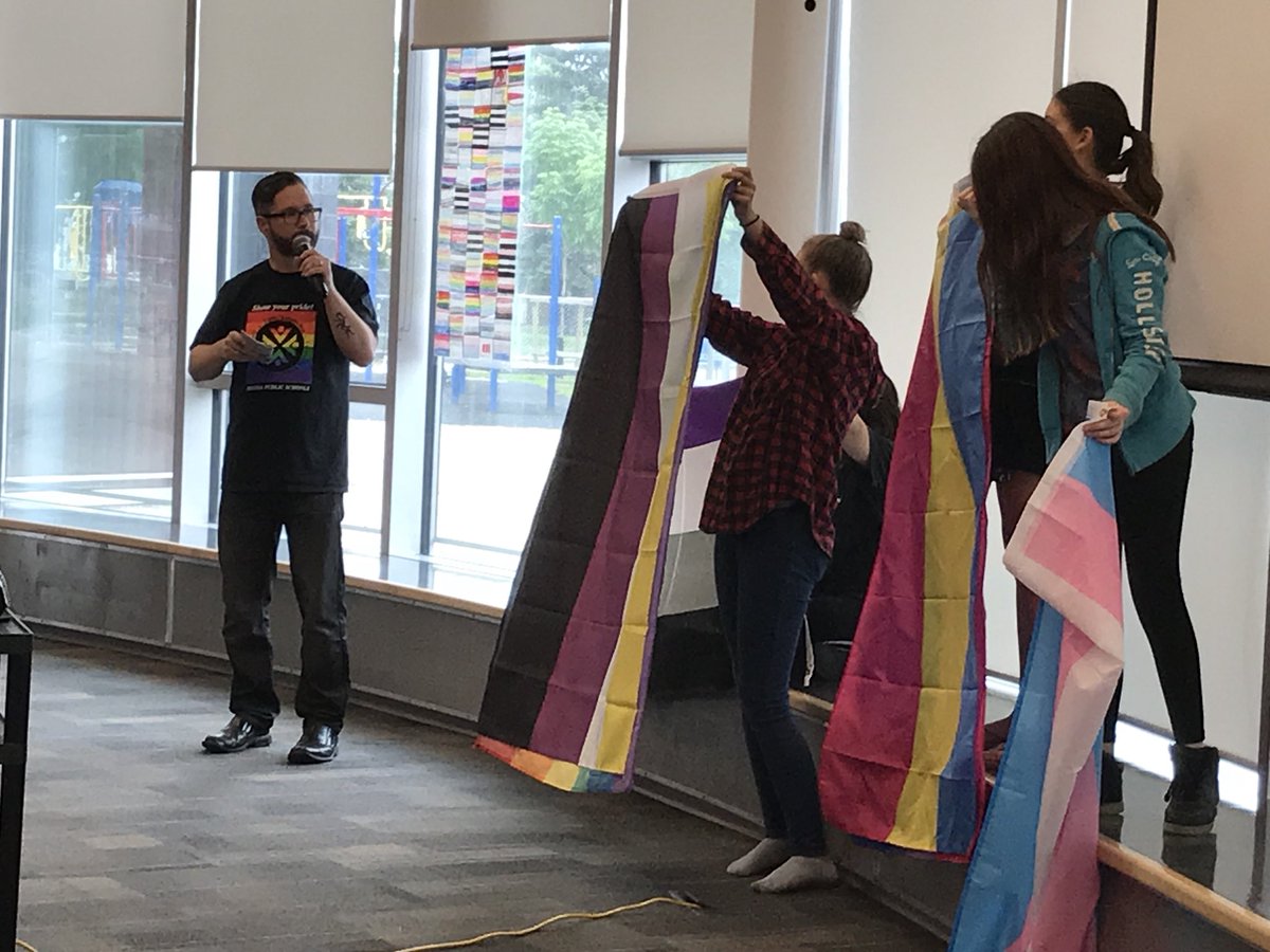 SherryReavley's tweet photo. Pride Assembly @7Stones_School with @7StonesGSA and special guest Wesley Keewatin. Flags, video, and lots of love! https://t.co/zfg2jqOuS9