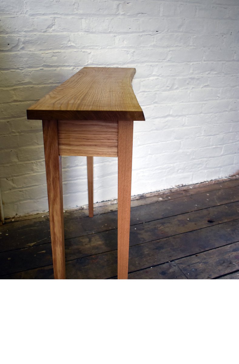 Our Waney Edge Console Table is now available on our Etsy Store VISIT: goo.gl/FbzMP9 #consoletable #hallwayfurniture #etsymanchester #madeintameside #oaktable #liveedgefurniture #handmade