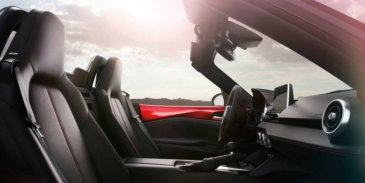 Experience Summer in the Mazda MX-5! Stop by Premier Mazda to really experience summer in style! Schedule your Miata Test Drive with the top down today!!  ☀️🏎 #ZoomZoom #Miata #TGIF #SummerTime