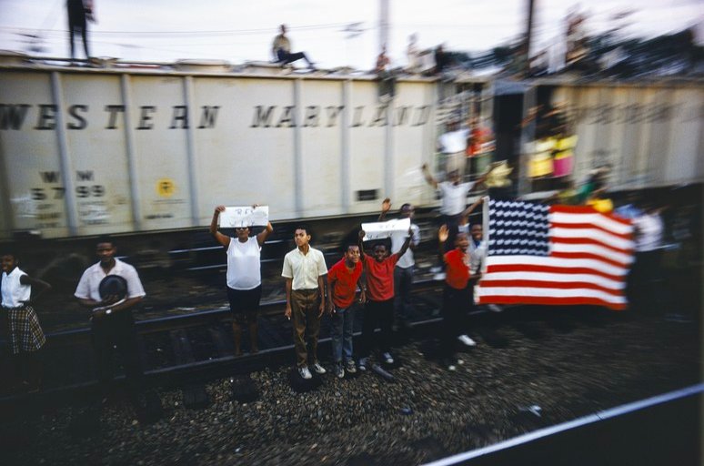 BobbyKNetflix's tweet photo. They waived, saluted, held signs, flew the flag, and cried. When Bobby’s body was brought from NY to DC for burial on this day 50 years ago, crowds lined the funeral train tracks so densely that the 225-mile journey took eight hours instead of four. RIP https://t.co/LUkH6Pfilv https://t.co/FEa4MyPlNY
