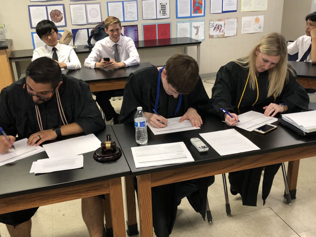 _wharris's tweet photo. CSI presentations and Judges Deliberations! Mr. Ponce, Mr. Fanning, and Mrs. Young.  Love the robes and gavel. Guest Judge Mr. Standerfer! @rsahighschool #Androids https://t.co/MHxHdLxrEB