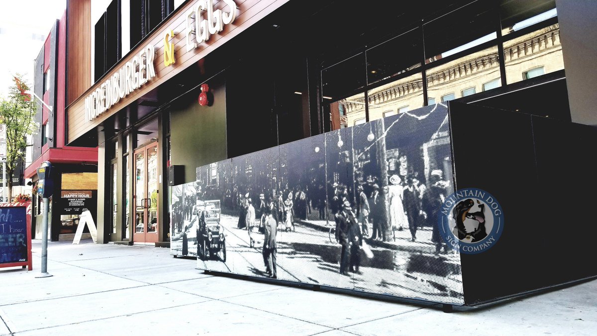 MtDogSignCo's tweet photo. Signage challenge? Required patio fence is not attractive.  Solution? Really cool vintage photo graphics! @IncrediburgEggs Great space, great menu, great food, great graphics!  #vinylmural    #functionalcanbefun  #jacklovessigns https://t.co/UyB4WFPQMn