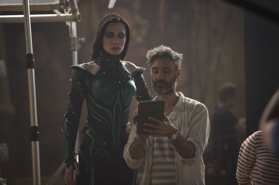 IndieWire's tweet photo. Taika Waititi helps Cate Blanchett find her inner goddess on the set of #ThorRagnarok. See more behind-the-scenes photos: https://t.co/KnhSHNusKY https://t.co/39OfVGyFyz