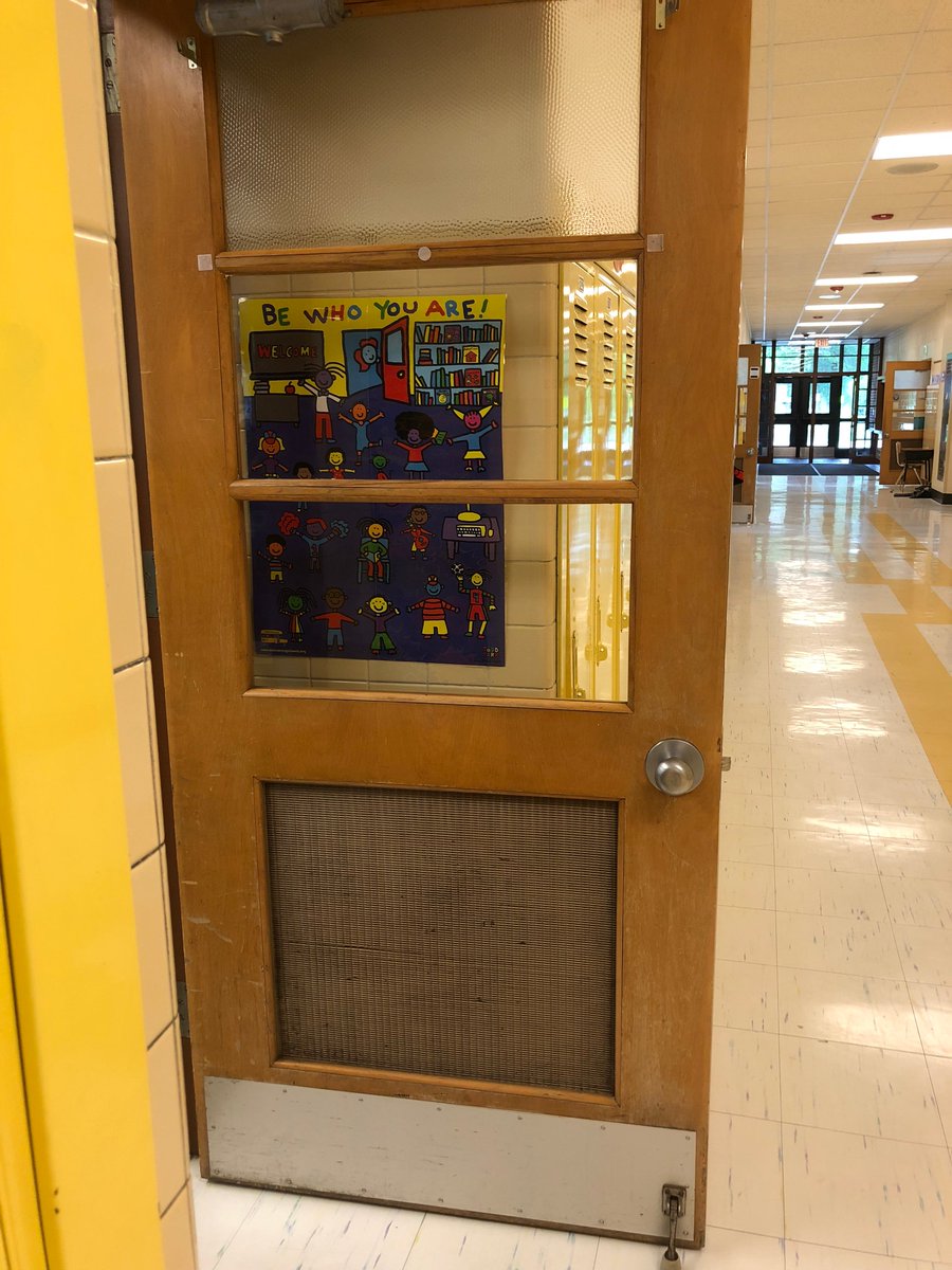 A poster on a door that says "Be who you are!"