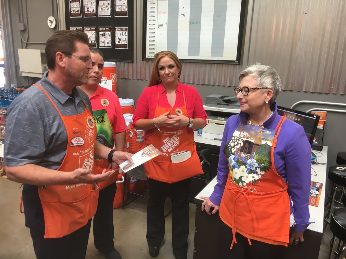 RVP Donny Sanchez presenting Carol Tome with a regional merit badge for living our values.D214strong ..