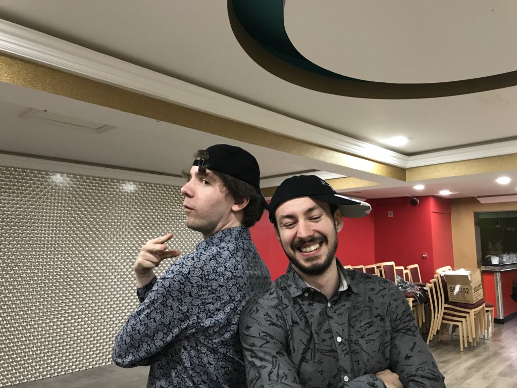progpal2018's tweet photo. @RobBrock93 and @Callumjmclean modelling fabulous (even if they’re last season) @ICALmanchester baseball caps for the auction. Who can resist a look like this? https://t.co/yonyJa4iQr