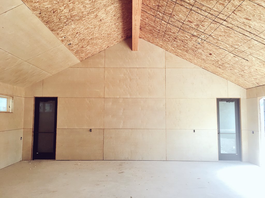 risingbarn's tweet photo. Stain grade birch plywood makes for a pretty sexy finish don’t you think? At roughly 2,200 square feet, this mixed-use building in the Texas Hill Country is our biggest project to date. https://t.co/yhA0zvcgrX