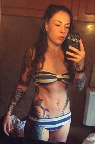 LoveMMALadies's tweet photo. So many fights this weekend. Good Luck to this #BadAss #SuicideGirl #ThoseHeels #GirlsWithInk https://t.co/AOUXLIxDfk