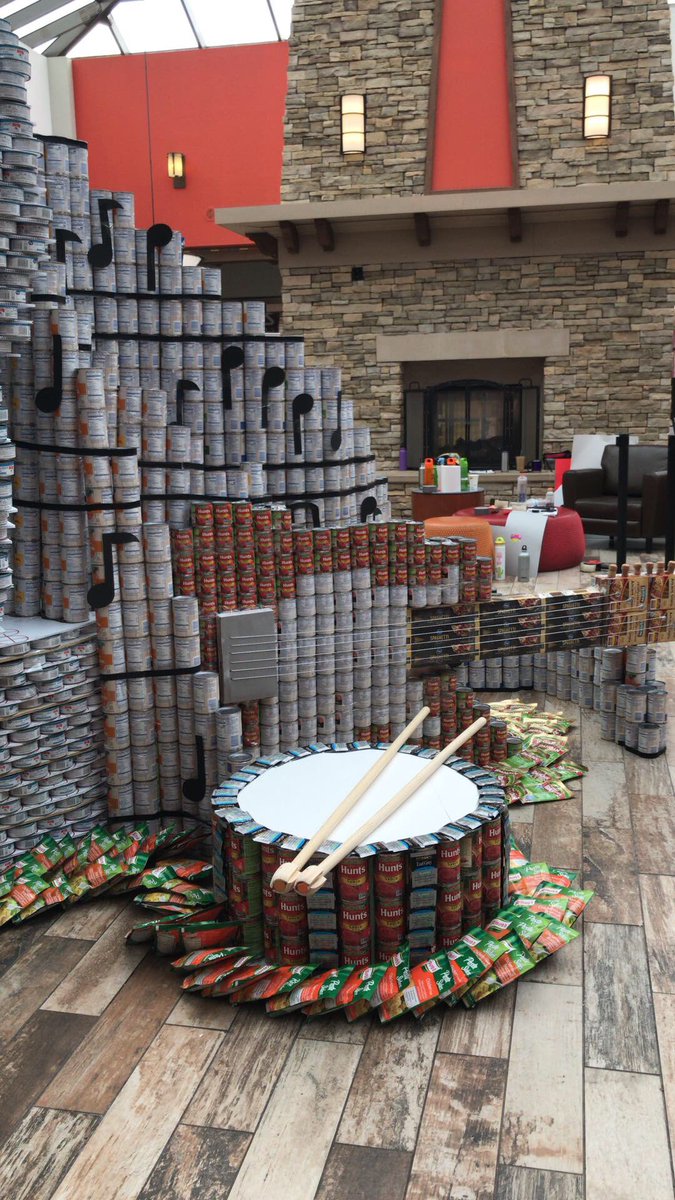 StudioSWArch's tweet photo. Over 10 hrs of work went into today’s #CANstruction2018 sculpture. We’re so thankful to all our sponsors and our awesome team! #RockCANRoll #CanSantaFe2018 https://t.co/KBxDCglUdK