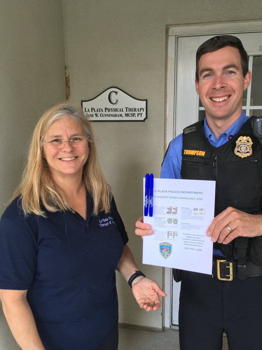 chief_601's tweet photo. This week LPPD PFC Philip Thompson stopped by La Plata Physical Therapy to provide staff with educational material on how to spot counterfeit currency. Assisting our business community is priority at LPPD. #LaPlataPD #communitypolicing https://t.co/oII7AXh5s2