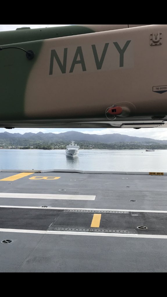 AirlieWalsh's tweet photo. Lurking in the warm waters off Fiji, a Chinese “spy” ship, coming into port next to the @Australian_Navy’s HMAS Adelaide. Coincidence? Details @9NewsAUS #SouthPacific #9News https://t.co/GDTIyEx8xy