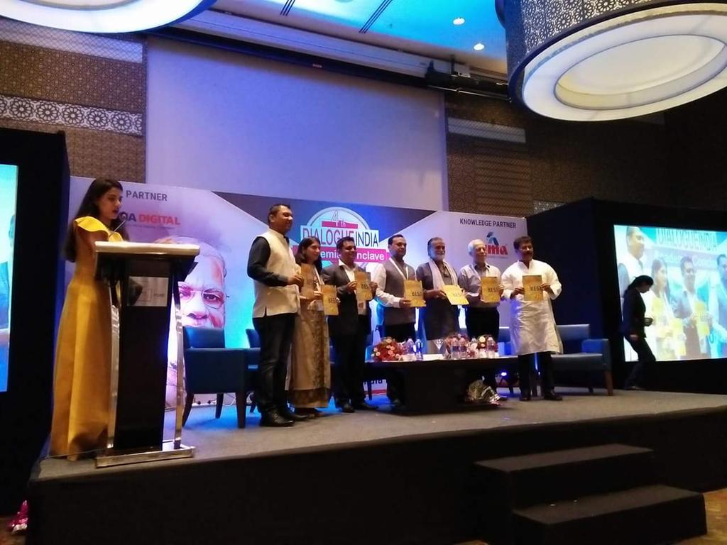 asmaacademia's tweet photo. The dignitaries present at the event have just formally inaugurated the book "Dialogue India - India's Best Colleges"! #DialogueIndia2018 #Pune #DIAcademiaConclave #DialogueIndiaRanking #ASMA https://t.co/XGL2vn97nX