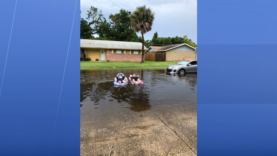 MyNews13's tweet photo. PHOTOS: Residents float down Port Orange streets after heavy rain. #flooding #portorange #volusiacounty #keepcalmandfloaton https://t.co/IG1etUMVts https://t.co/YaK9AmPxrv