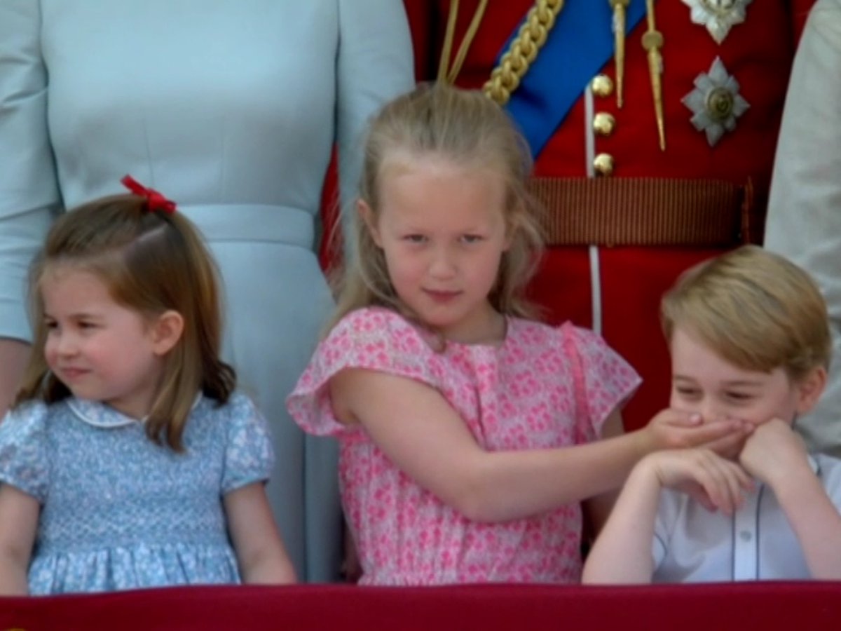 Savannah Phillips is not impressed by Prince George’s rendition of the national anthem. Princess Charlotte looks away... #TroopingtheColour #QBP2018