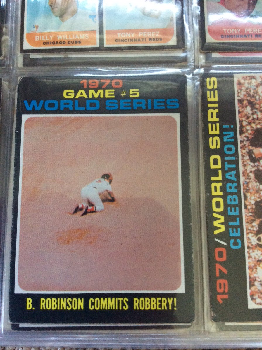 delspacefranco's tweet image. This card has always fascinated me - it seems as if the shot was taken 100 miles away on an island somewhere and looks like Brooks is wearing a catcher’s mask #collect #71Topps