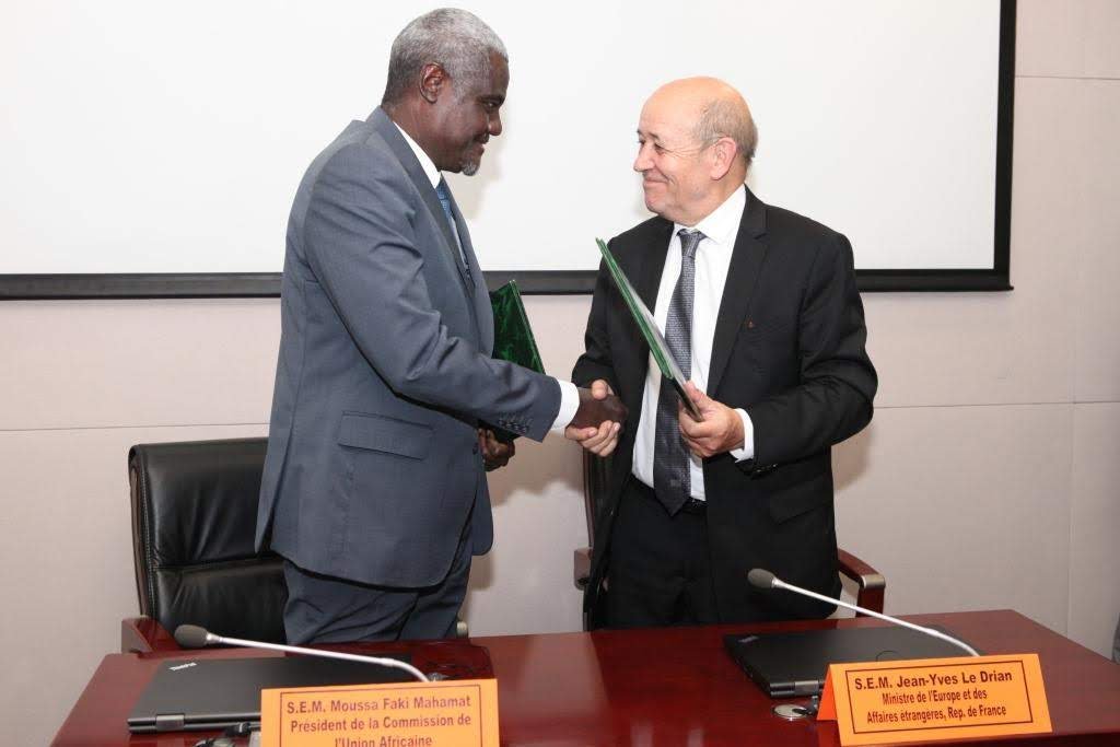 AUC_MoussaFaki's tweet photo. I met French minister for Foreign Affairs @JY_LeDrian last night. We discussed peace&amp;security in the Region and also signed a Declaration of Intent for further engagement with @francediplo. Read our joint  communiqué here. https://t.co/du8pkbmowI https://t.co/mYmguHTdvH