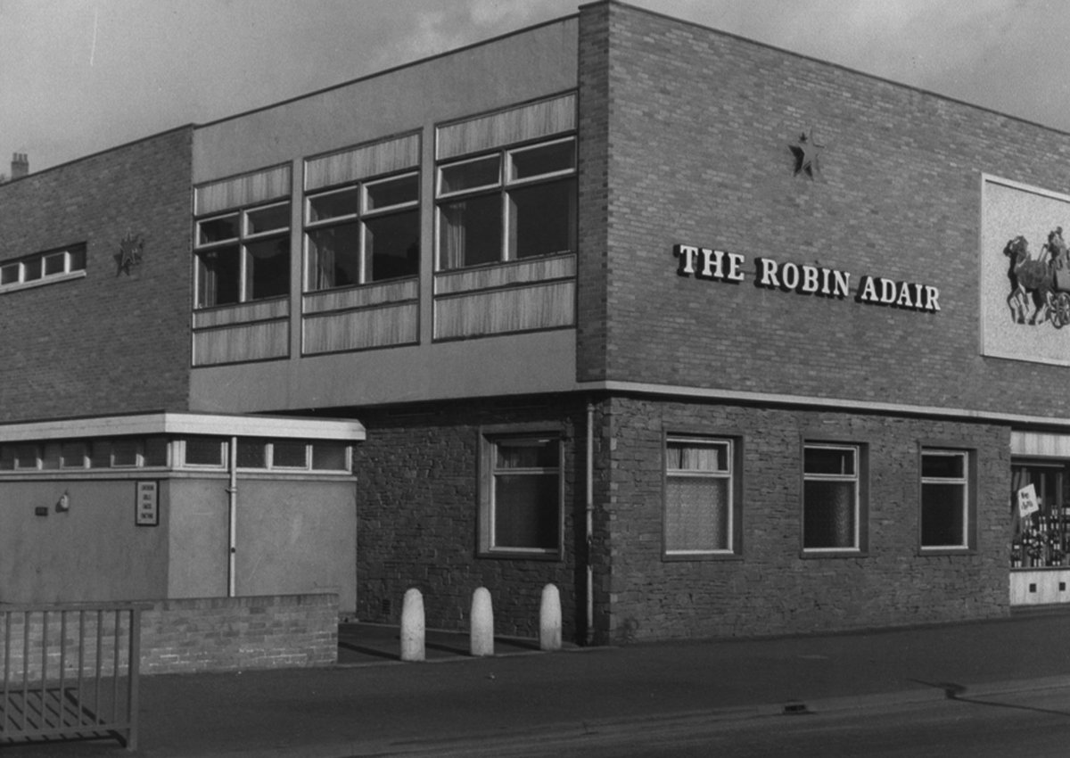 We flew past Airmstrang's factory, and up to the Robin Adair
 Just gannin' doon te the railway bridge, the 'bus wheel flew off there
 The lassies lost their crinolines off, an' the veils that hide their faces
 An' aw got two black eyes an' a broken nose gannin' te #blaydonraces