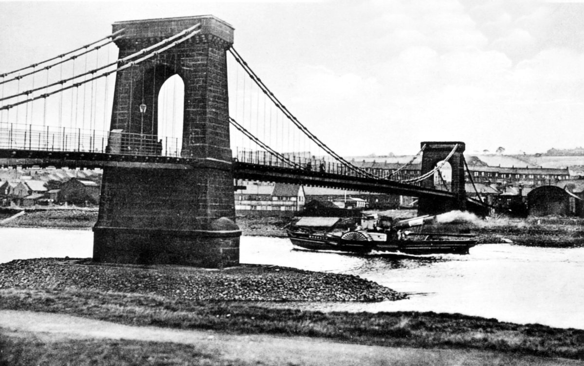 We flew across the Chain Bridge reet into Blaydon toon,
 The bellman he was callin' there, they call him Jackie Broon;
 Aa saw him talkin' to sum cheps, an' them he was pursuadin'
 To gan an' see Geordy Ridley's concert in the Mechanics' Hall at Blaydon. #blaydonraces