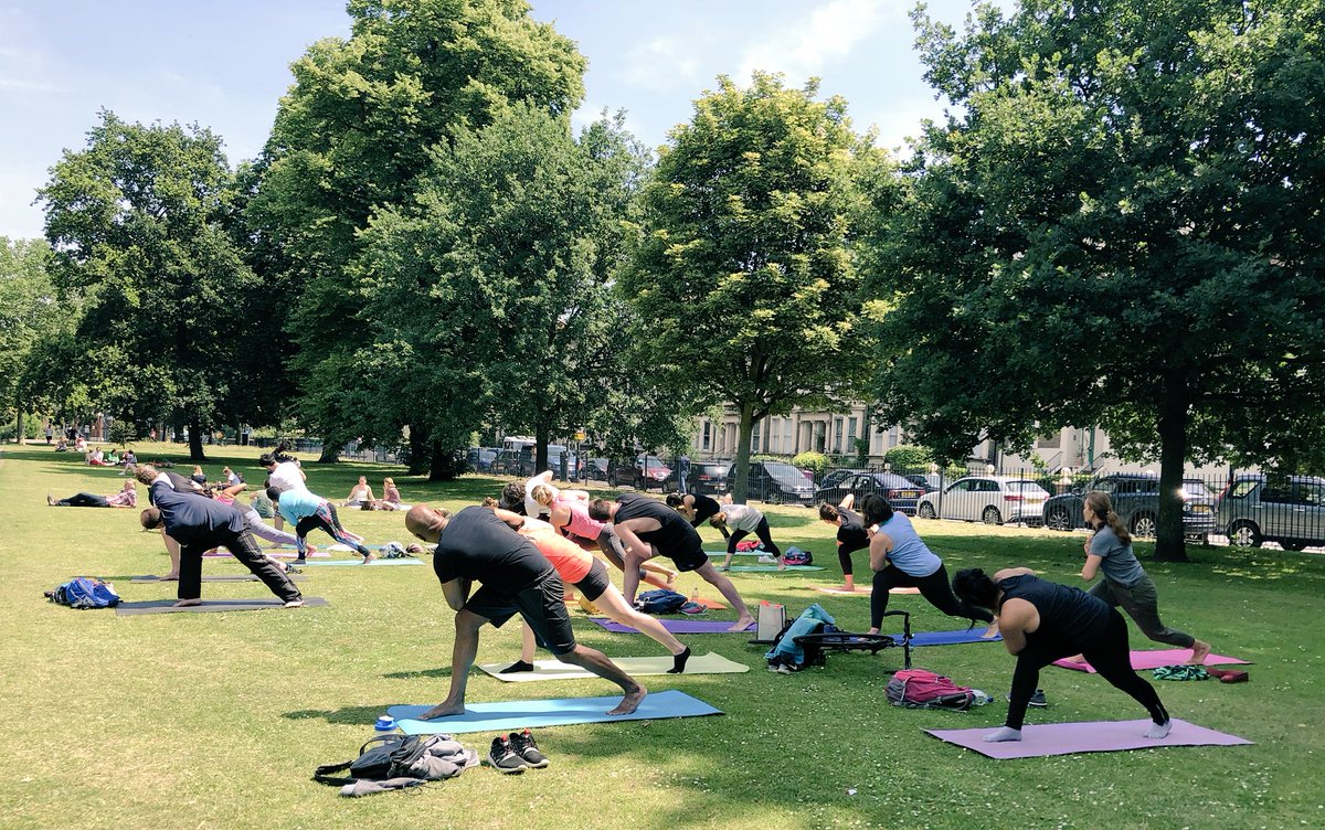 Pic from today's <a href="/OurParksUK/">Our Parks</a> yoga in <a href="/VickyParkLondon/">Victoria Park</a>. Luckily, the #TroopingtheColour fly-past waited until the end - can't have the Queen ruining our final relaxation! 😉#yogainthepark #NaturesGym #MadeToMove