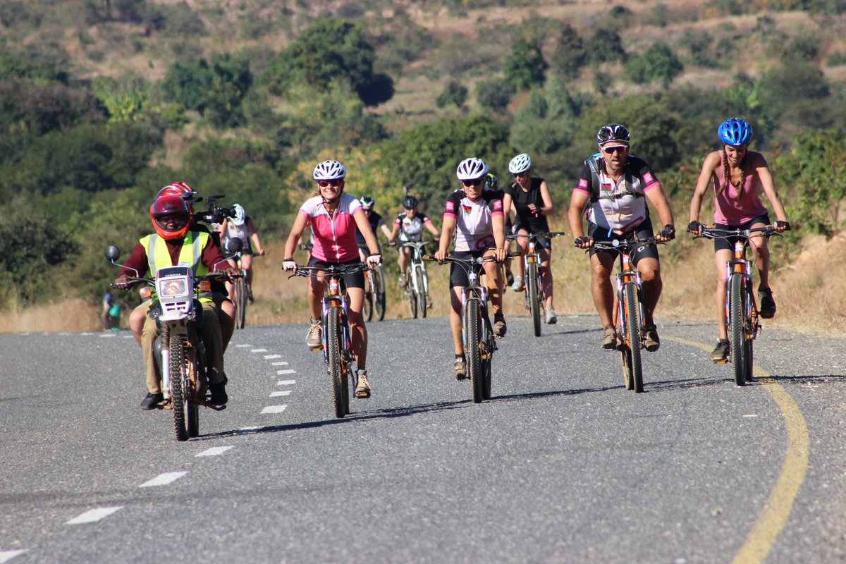 PlanMalawi's tweet photo. After a long and tiresome cycle up and down the hills in Ntchisi yesterday, the cyclist are now on a relatively easy ride to Mtunthama, Kasungu through Malomo. ETA 16:00. #CycleForPlan #EndChildMarriage #GirlsFirst #Malawi https://t.co/OLRSbMoLdZ