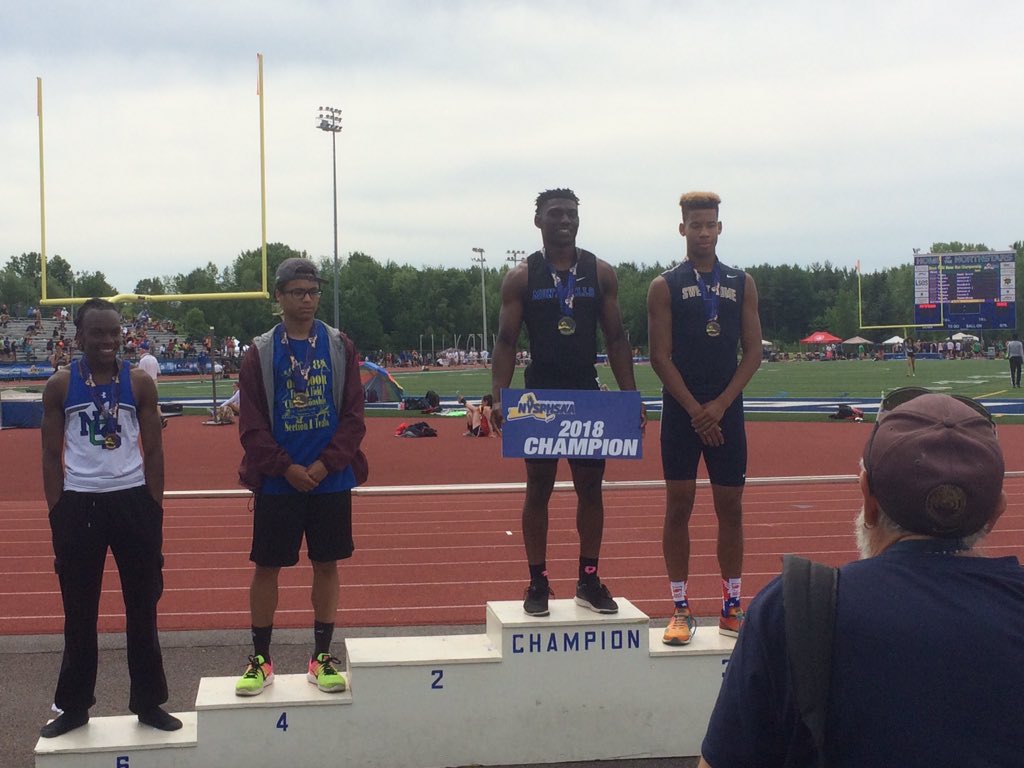Nate davis on the medal stand after his 3rd place 100 meter finish.  #preptalklive