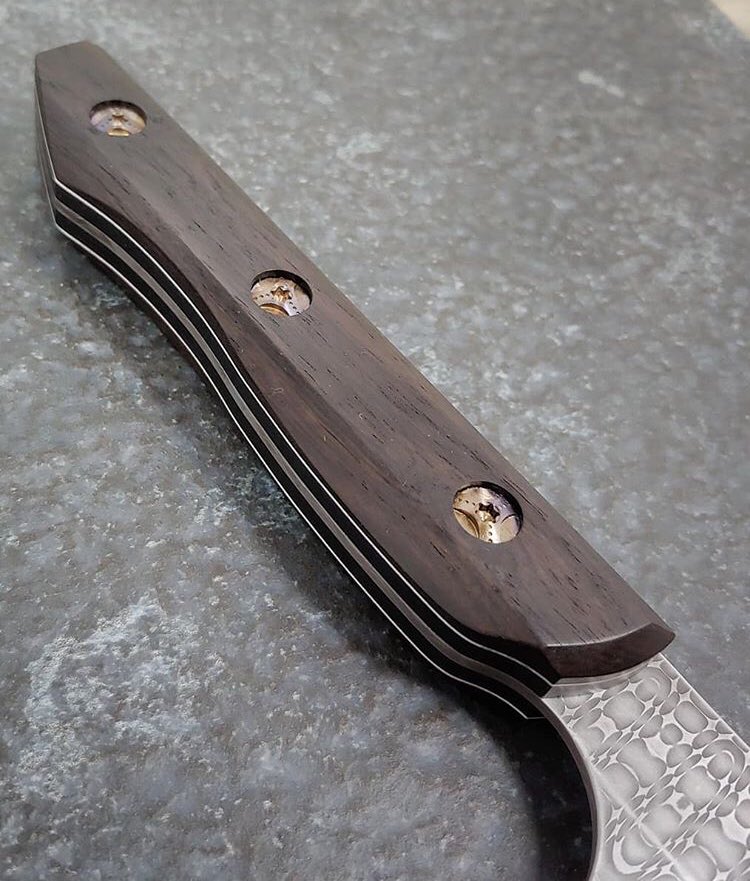 Set of knives I made for Chef Chris Turgeon, previously of Chicago's 42 Grams, as he opens his new restaurant Wildebeest. 10 inch and 3 inch in 3V/154cm Damascus, black g10 liners, and African Blackwood with hand torched Titanium hardware #DIY #knives #art #creativity #awesome