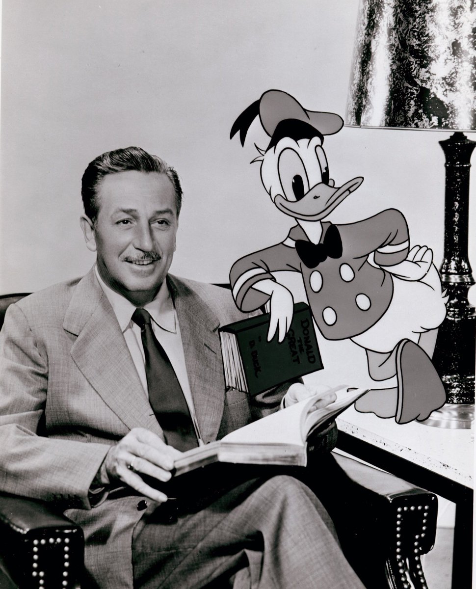 WDFMuseum's tweet photo. Happy Donald Duck Day! Our favorite animated avian made his debut today in 1934. Here Walt Disney poses with Donald on his 20th birthday in 1954. https://t.co/jrlZ7xfoIH