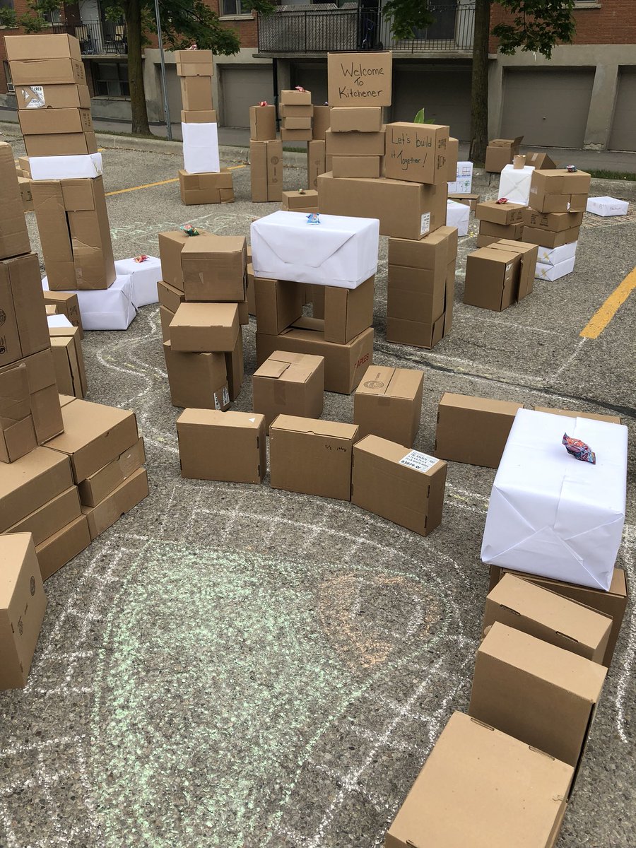 Kids at Centreville-Chicopee are building towers in cardboard town. #NeighboursDay