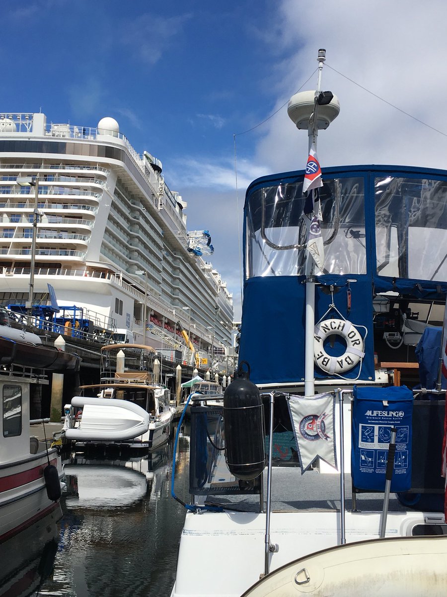AdventureCkr's tweet photo. #AnchorBabe docked in the shadow of @CruiseNorwegian #TheBliss @PortofSeattle #BellHarbor I am wondering how I can add a slide to my boat! https://t.co/gxvbvuef4d