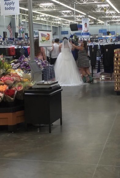 madison_stuckey's tweet photo. Who else can say that there was a wedding at Walmart in their hometown? https://t.co/TbSZmtr1nZ