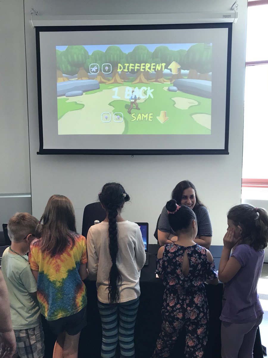 Crosbie_Jen's tweet photo. Avalon and Kira showing off the Mega Team executive function training video game to eager participants @MuseumofNature #BrainAtTheMuseum #BrainBonanza @OntarioBrain @PONDNetwork https://t.co/3cp7rUddGa
