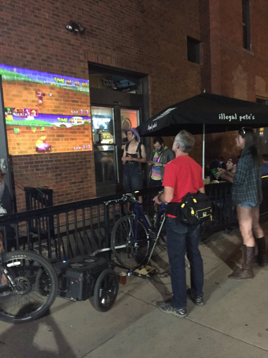 boulderbikenite's tweet photo. After party at @illegal_petes , were going big ! Thanks to everyone that made it out 

#mobileprojector #HappyThursday 
#boulderbikenight 
#axaapicoprojector 
#portableN64
#bikeNride https://t.co/IYKgJ3u2Rw