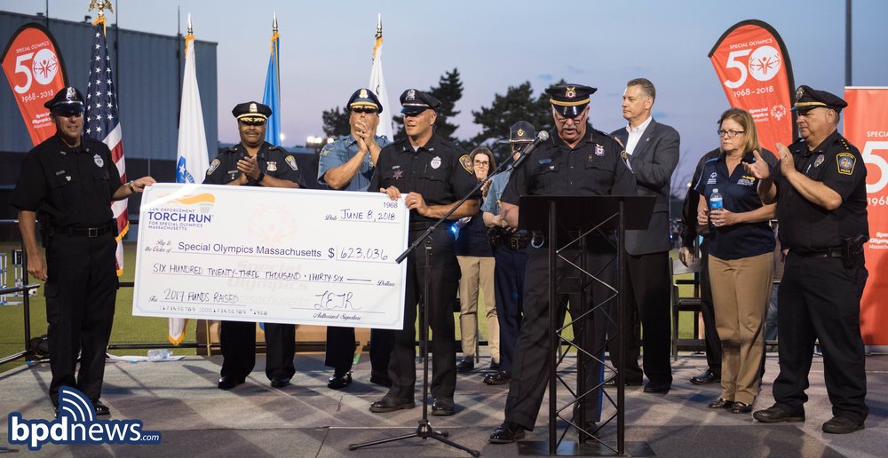 bostonpolice's tweet photo. So impressed and grateful to all of the officers who helped raise and present a check in excess of $623K to support an incredibly wonderful organization and cause like the @SpOlympicsMA and the #SOMASummerGames!!! https://t.co/ySFGgpQ8ou