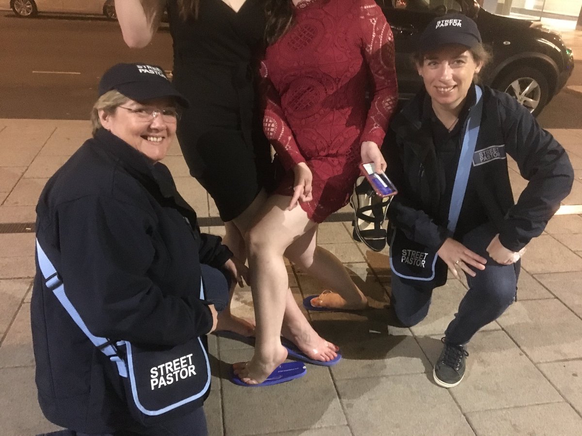 CovStreetPastor's tweet photo. Two ladies with comfy feet hurrah for flip flops https://t.co/NzAVFcD1WG