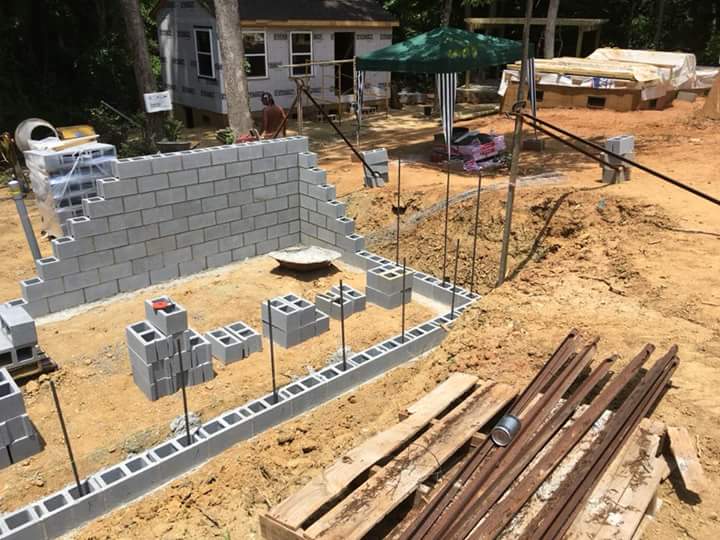 TinyHousesGSO's tweet photo. Last foundation on Causey St. is well under way. Thank you to all the amazing volunteers that make this possible. #THCD #THG #THHP #Greensboro #HighPoint #NC https://t.co/c8BUn833a1