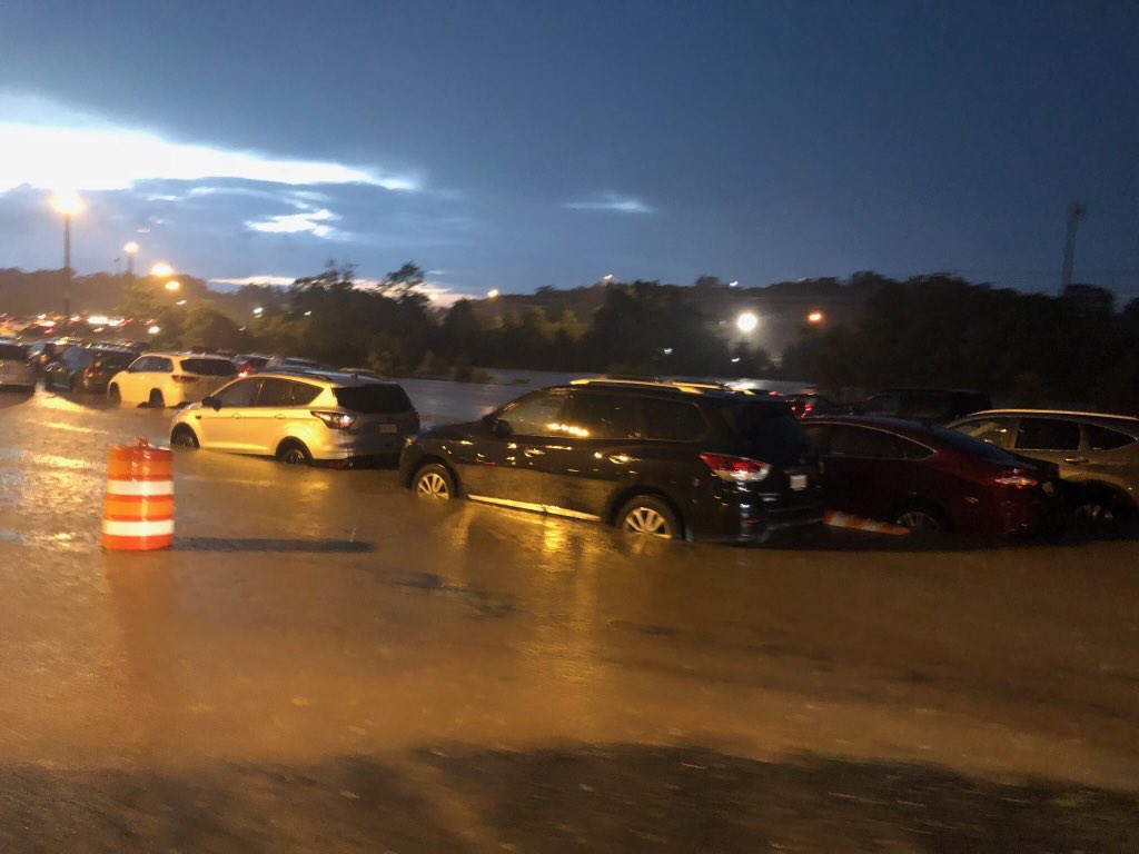 JPosvar's tweet photo. @tomduffywiz @JiffyLube_Live @davematthewsbnd Bwhaha we’ve had PLENTY of storms!!!! Just never left...but tonight was outta control and there was lightning and a tornado warning. Someone took a pic of the parking lot.... https://t.co/LXGm8zIrYS