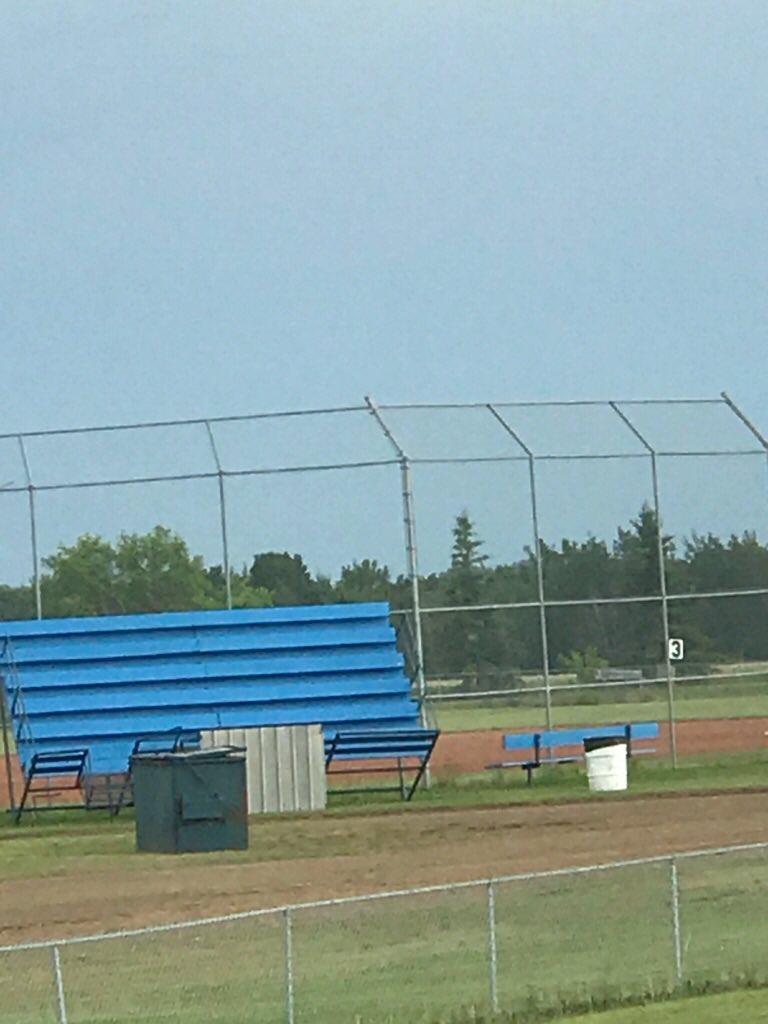 Wind took down the announcers booth and bleachers. No clue where all the bottle caps on the ground fell out of...