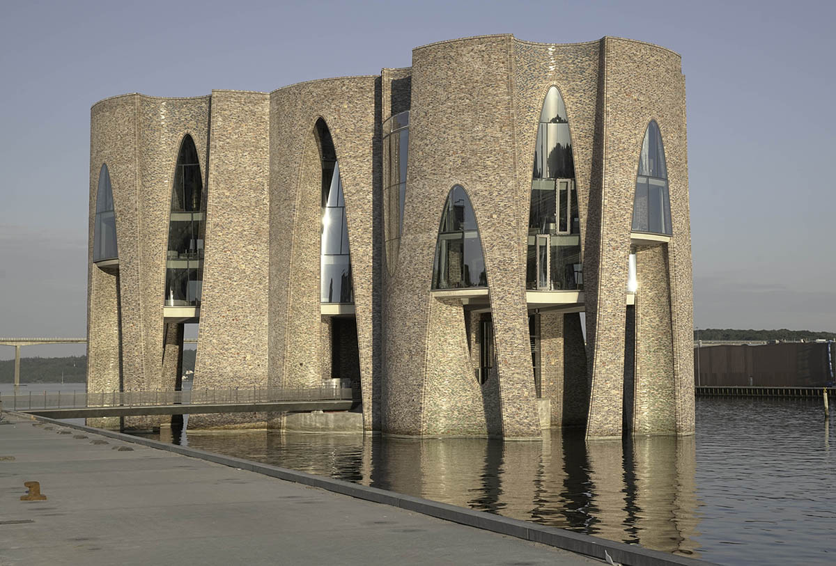 WACommunity's tweet photo. Artist Olafur Eliasson completes his first building with cave-like appearance in Denmark: https://t.co/9IN7P47mfL #denmark https://t.co/rc82gPIJUE