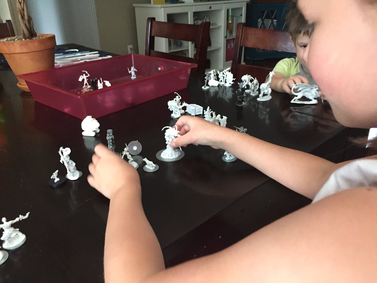 masterthegamerp's tweet photo. Look at what my kids are doing right now. Playing with my @reapermini at the dining room table. Future gamers for sure! View the pinned post for my game with my daughter last week. #reaperminis #reaperbones #perfectforkids #dnd #tabletoprpgs https://t.co/342lRrg6IY