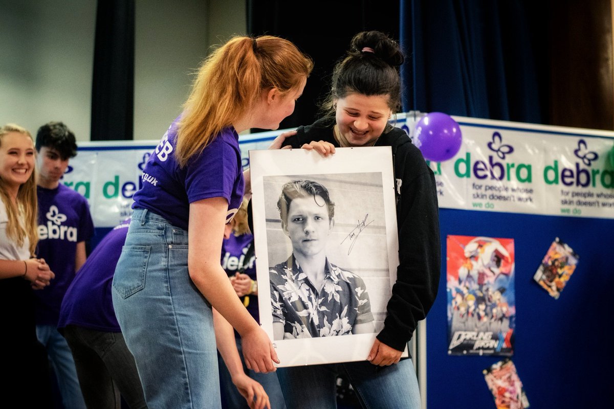 milliemopps's tweet photo. On Friday night @WyHighAcademy we ran a quiz night in honour of James Dunn raising money for @CharityDEBRA ! I would not have been able to pull of such an amazing night without the help of my friends and @Tbrotherstrust for sending us a signed photo of @TomHolland1996 https://t.co/wB2ESB9IX1