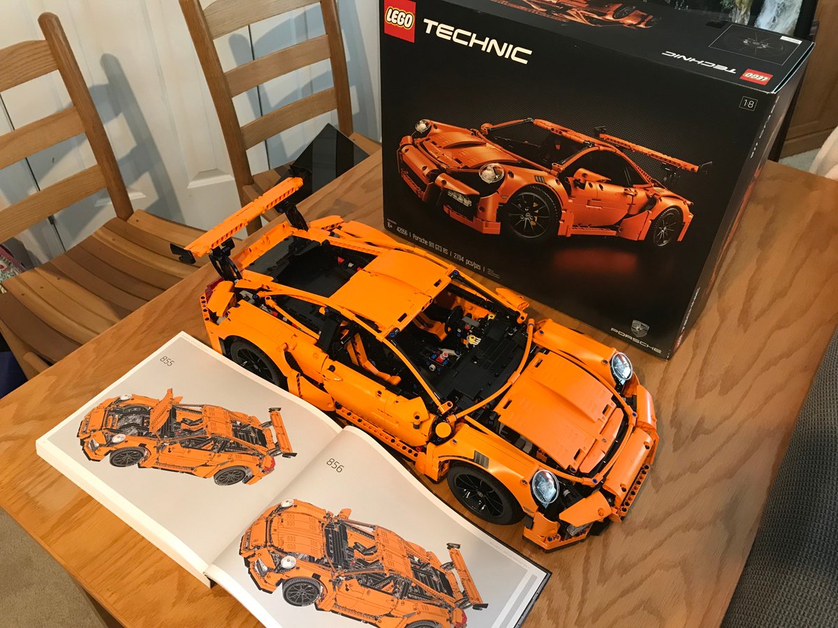 tfsbuck's tweet photo. My son and I finished the @LEGO_Group Porsche 911 GT3 RS (2,704 pieces). The gears in it are amazing (transmission works). It's really well designed, the manual is great (856 steps), and the pieces are in four separate boxes (box 1 is the biggest). Highly recommended. https://t.co/HFYvmC8KUx