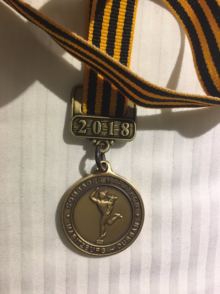 Tshololejaka's tweet photo. Sometimes real joy comes in very tiny packages. Comrades Marathon bronze medal โ๐ฝ#Comrade2018 #Comrades2018 https://t.co/RvzGqIoqMT