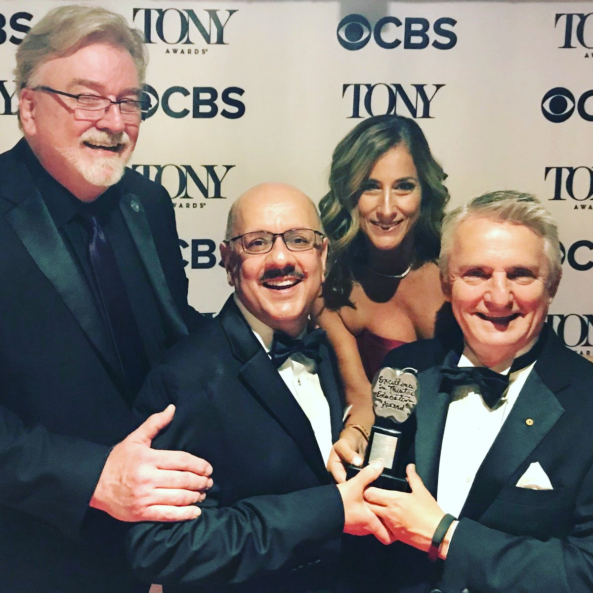 President Farnam Jahanian, Carnegie Mellon College of Fine Arts Dean Dan Martin and @cmudrama Head Peter Cooke with the 2018 Excellence in Theatre Education Award winner, Melody Herzfeld after she was honored on @TheTonyAwards stage tonight. #cmutonys #applaudmyteacher