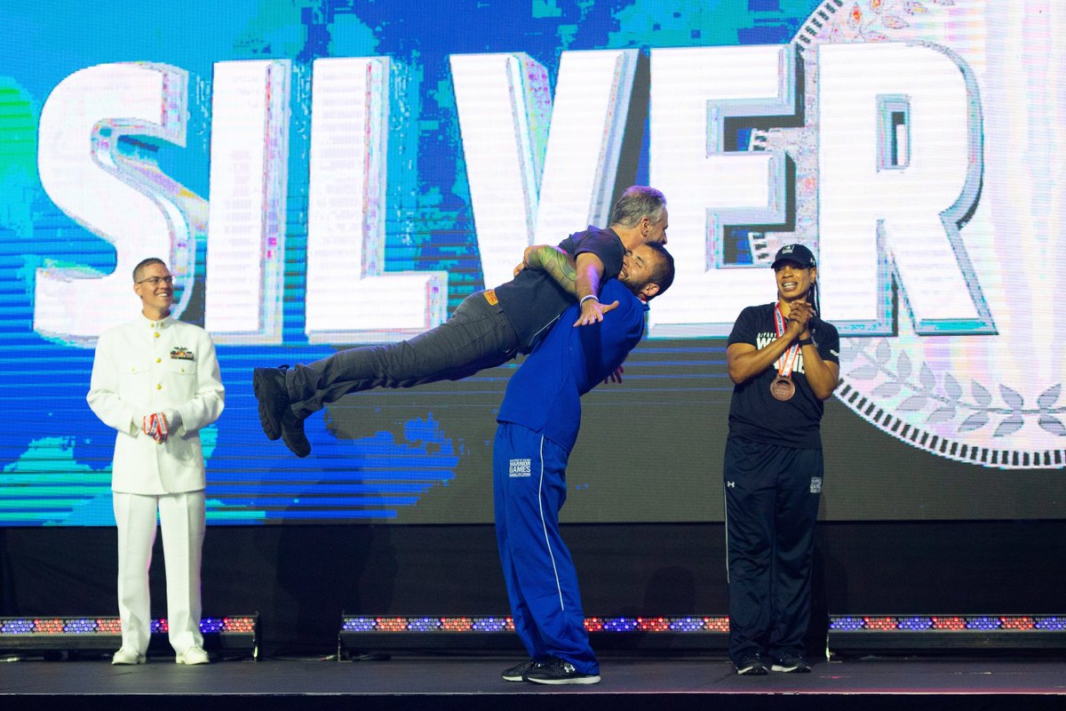 Ultimate Lift #ICYMI: #TeamAirForce Senior Airman Rafael Morfinenciso lifts comedian #JonStewart after receiving the Ultimate Champion 🥈 during the closing ceremony of the 2018 #DoD @WarriorGames at the @AF_Academy in Colorado Springs, Colo., June 9. #WitnessIt @AFW2