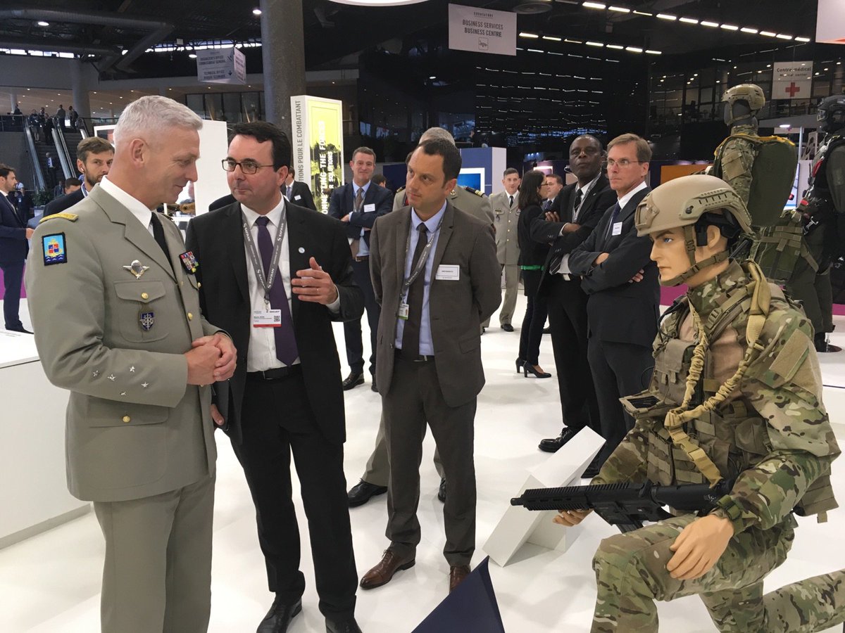 SafranElecDef's tweet photo. Le Général d’armée François Lecointre, chef d’état-major des armées (CEMA) et @MartinSion sur le stand @Safran à #Eurosatory2018. Présentation de nos solutions #Patroller #Geonyx #JIM Compact & #STERNA #NeoFelis #PASEO #eRider ... https://t.co/mwCPlQvke7