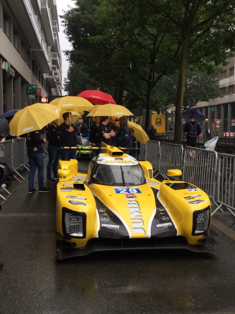 24hoursoflemans's tweet photo. The first car up this morning, the bright yellow #29 @RacingTeamNL Dallara P217_Gibson is bringing a bit of brightness to Place de la République #LEMANS24 #Scrutineering @GvanderGarde @jan_lammers and Fritz Van Eerd https://t.co/bZH0sdoVEb