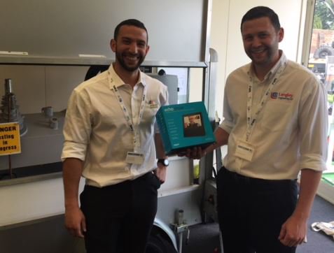 Langley_Eng's tweet photo. Langley Engineering give away Amazon Echo Show.  We were thrilled that Mourad was on site to receive his gift from Product Manager Jon Berry.  Thank you to everyone that entered our free draw, we are giving everyone that entered 20% off our ceramic knives https://t.co/CaDl2npapW https://t.co/oyWgIndtxl