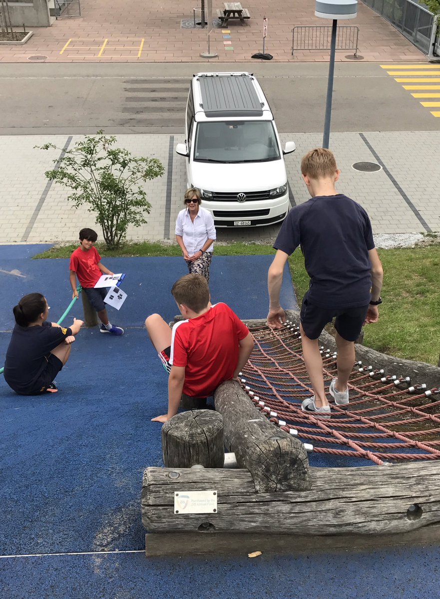 ellydilworth's tweet photo. Finding #math in the playground. #zisg4 end of year 'Math Trail' #zislearns #zisexperience #zismath. How many pieces of rope? What angle on the clock face? What fraction on the number line? https://t.co/r6YCldfK6M