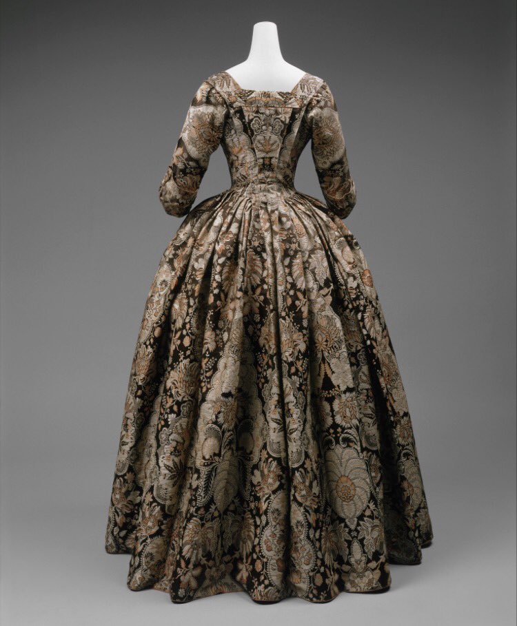 whatgrandmawore's tweet photo. Spitalfields 1725 dress. There are many examples of recycled/restyled dress, however, the @metmuseum states that fashion historian Janet Arnold after examining this garment, could find no traces of alteration. It therefore remains in its 'perfect' state. https://t.co/HurJGgCBwj